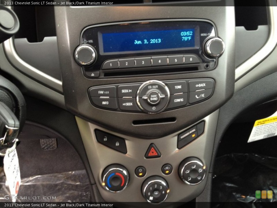 Jet Black/Dark Titanium Interior Controls for the 2013 Chevrolet Sonic LT Sedan #81778026