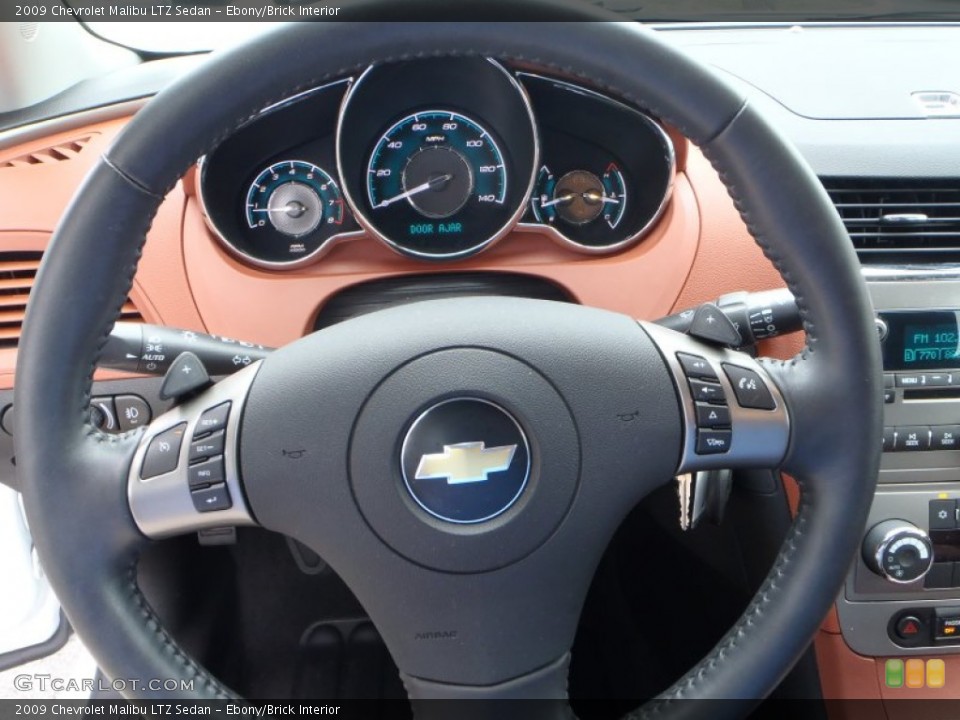 Ebony/Brick Interior Steering Wheel for the 2009 Chevrolet Malibu LTZ Sedan #81874883
