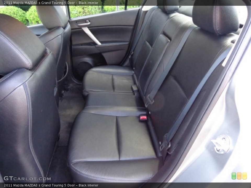 Black Interior Rear Seat for the 2011 Mazda MAZDA3 s Grand Touring 5 Door #81901936