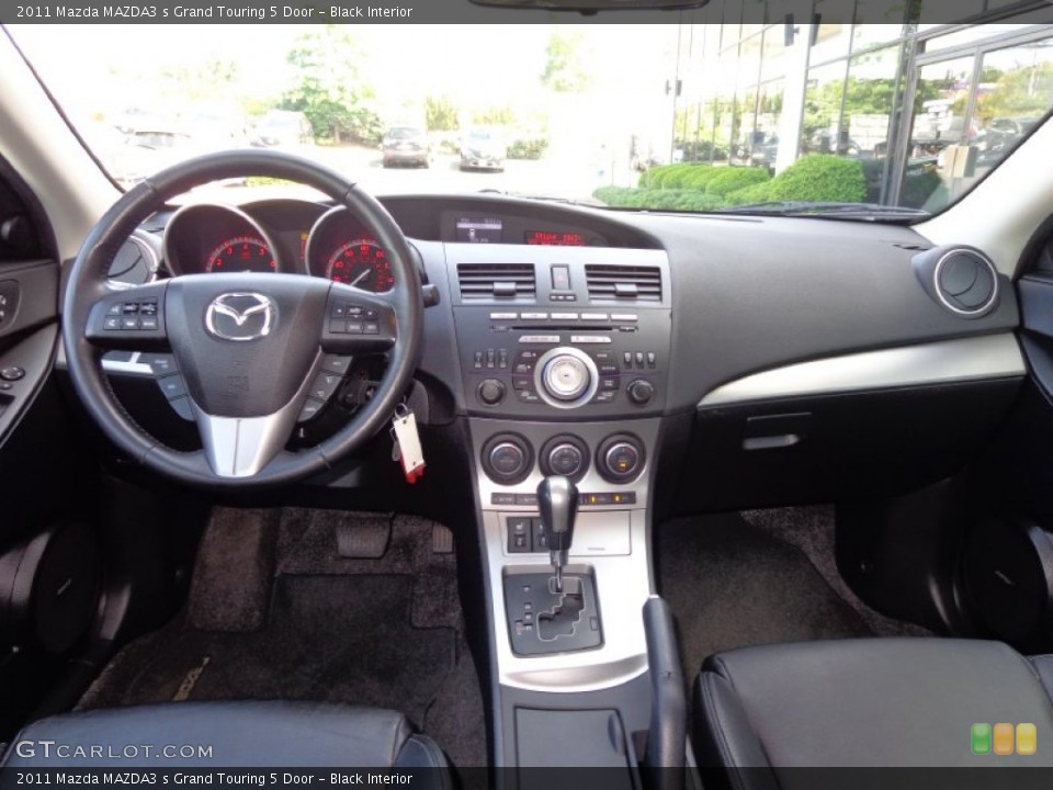 Black Interior Dashboard for the 2011 Mazda MAZDA3 s Grand Touring 5 Door #81902049