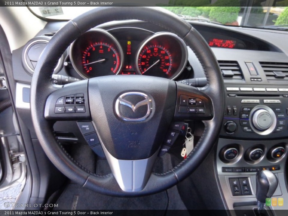Black Interior Steering Wheel for the 2011 Mazda MAZDA3 s Grand Touring 5 Door #81902066