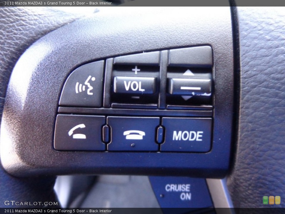 Black Interior Controls for the 2011 Mazda MAZDA3 s Grand Touring 5 Door #81902080