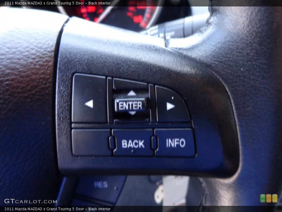 Black Interior Controls for the 2011 Mazda MAZDA3 s Grand Touring 5 Door #81902104
