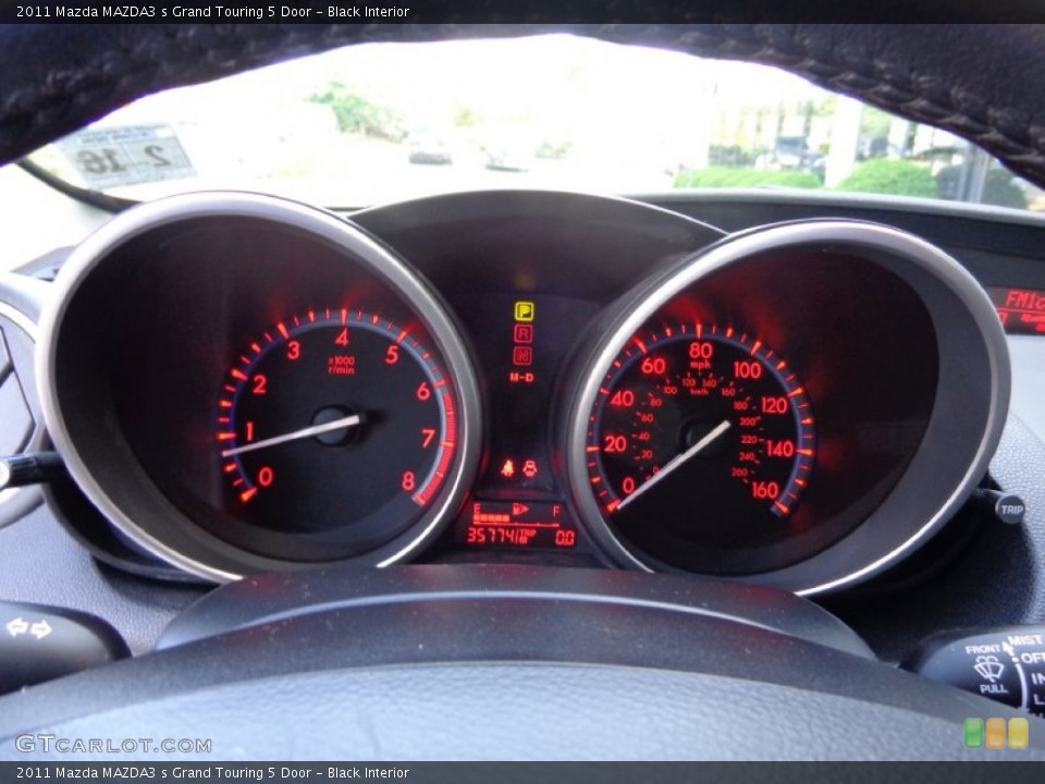 Black Interior Gauges for the 2011 Mazda MAZDA3 s Grand Touring 5 Door #81902128