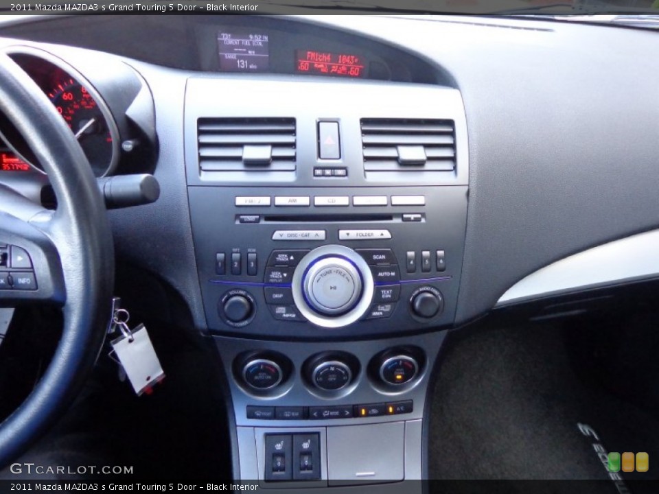 Black Interior Controls for the 2011 Mazda MAZDA3 s Grand Touring 5 Door #81902175