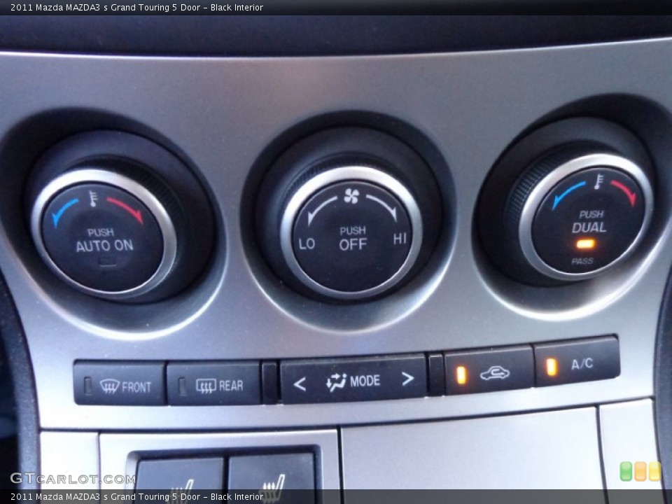 Black Interior Controls for the 2011 Mazda MAZDA3 s Grand Touring 5 Door #81902233