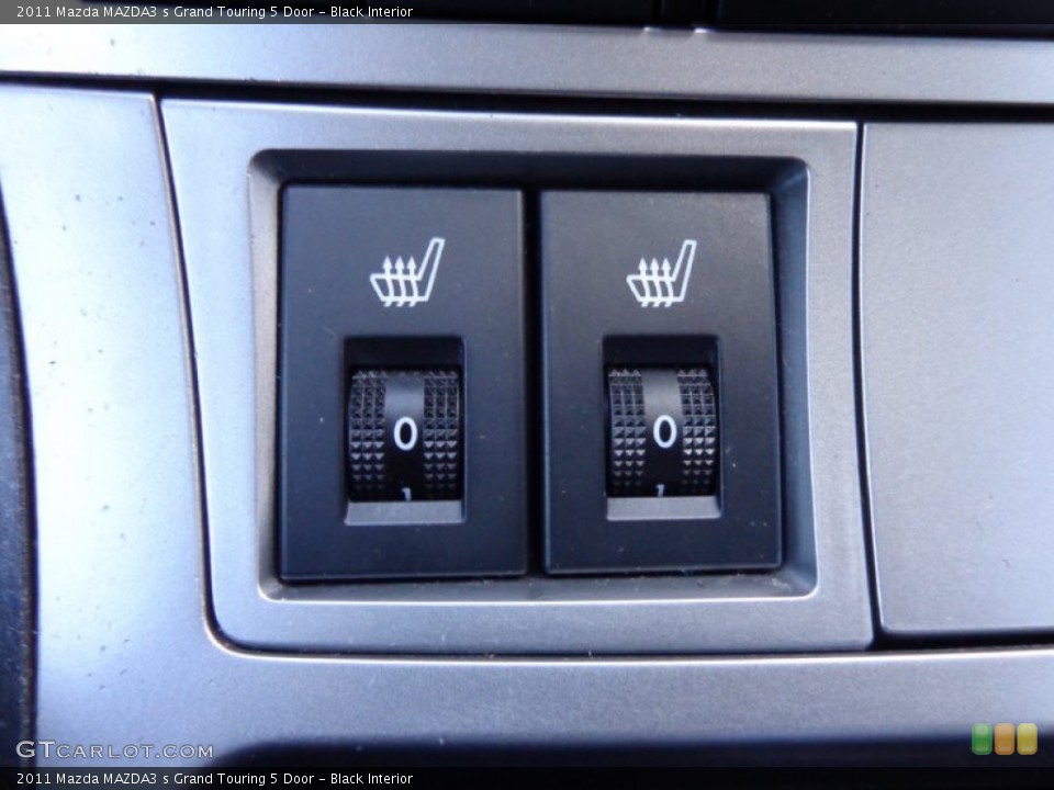Black Interior Controls for the 2011 Mazda MAZDA3 s Grand Touring 5 Door #81902257