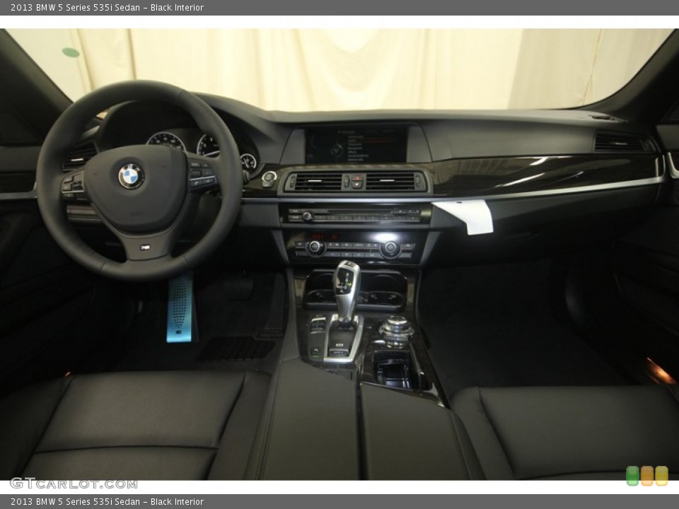 Black Interior Dashboard for the 2013 BMW 5 Series 535i Sedan #81938629