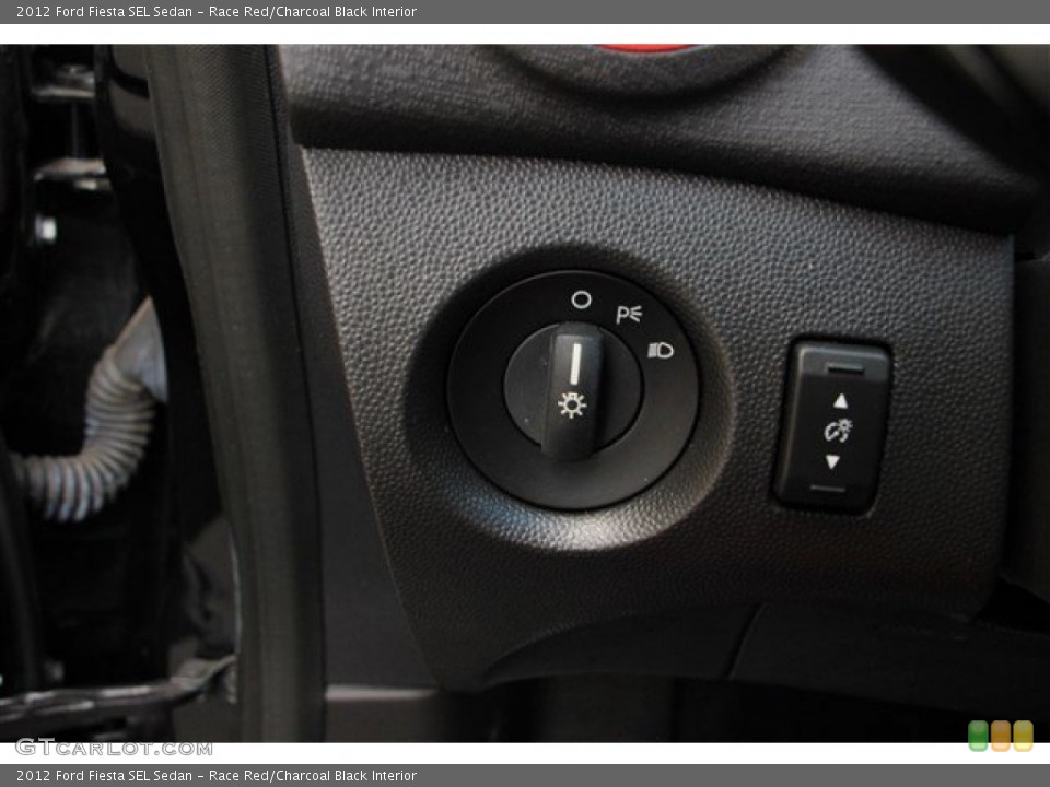 Race Red/Charcoal Black Interior Controls for the 2012 Ford Fiesta SEL Sedan #81946471