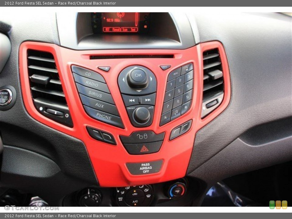 Race Red/Charcoal Black Interior Controls for the 2012 Ford Fiesta SEL Sedan #81946570