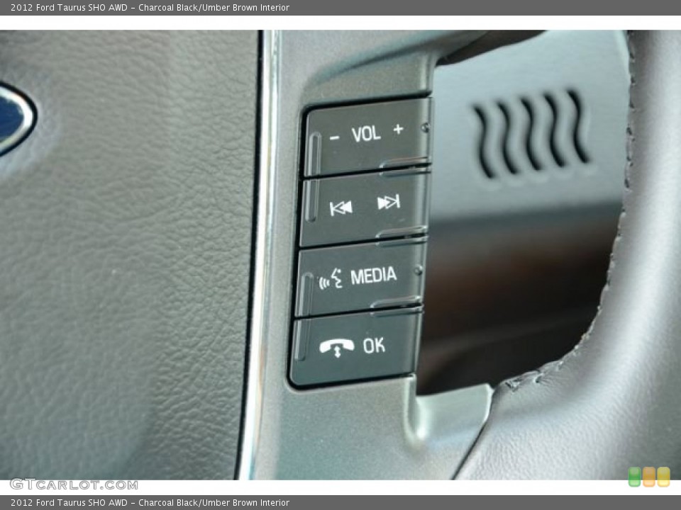 Charcoal Black/Umber Brown Interior Controls for the 2012 Ford Taurus SHO AWD #81949539