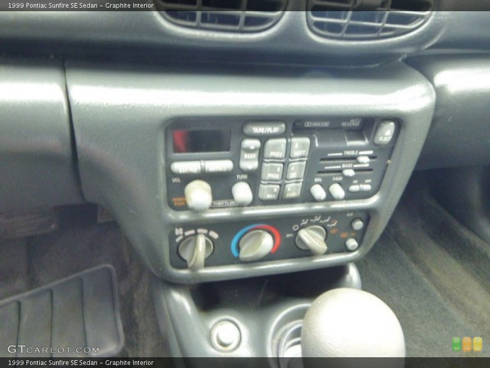 Graphite Interior Controls for the 1999 Pontiac Sunfire SE Sedan #81998177