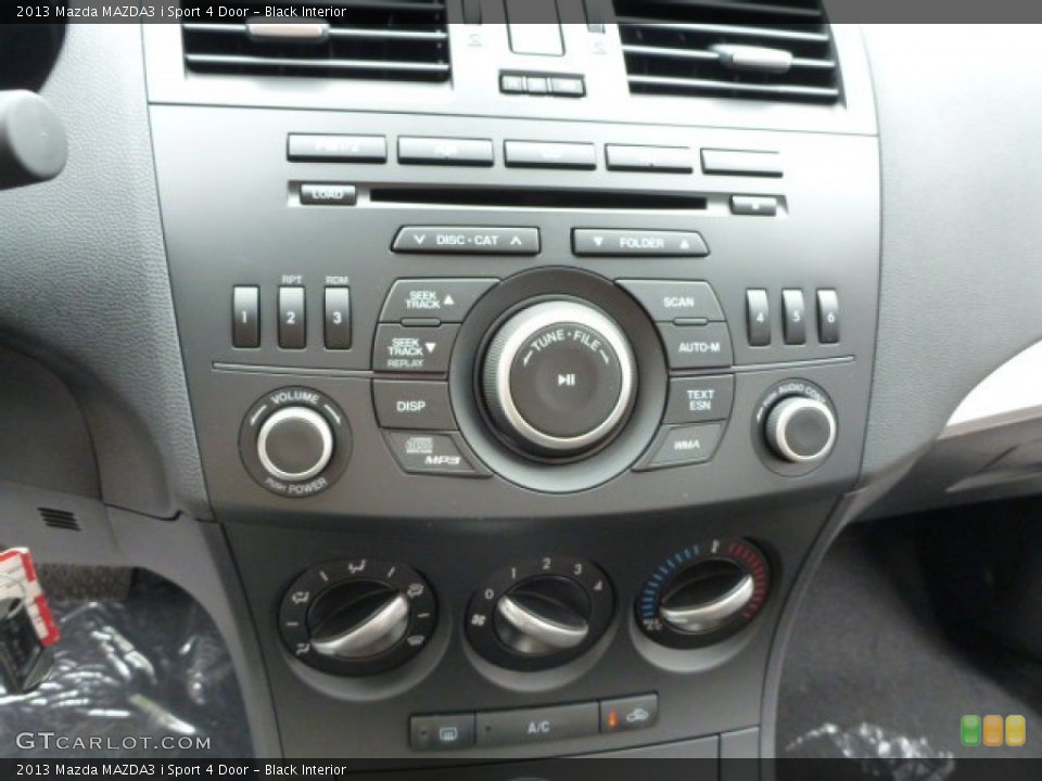 Black Interior Controls for the 2013 Mazda MAZDA3 i Sport 4 Door #82028227