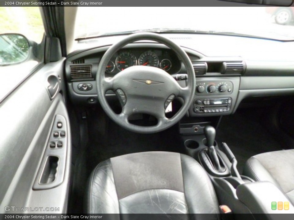 Dark Slate Gray Interior Dashboard for the 2004 Chrysler Sebring Sedan #82089478