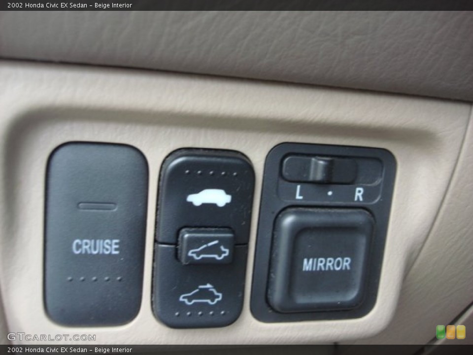 Beige Interior Controls for the 2002 Honda Civic EX Sedan #82109024