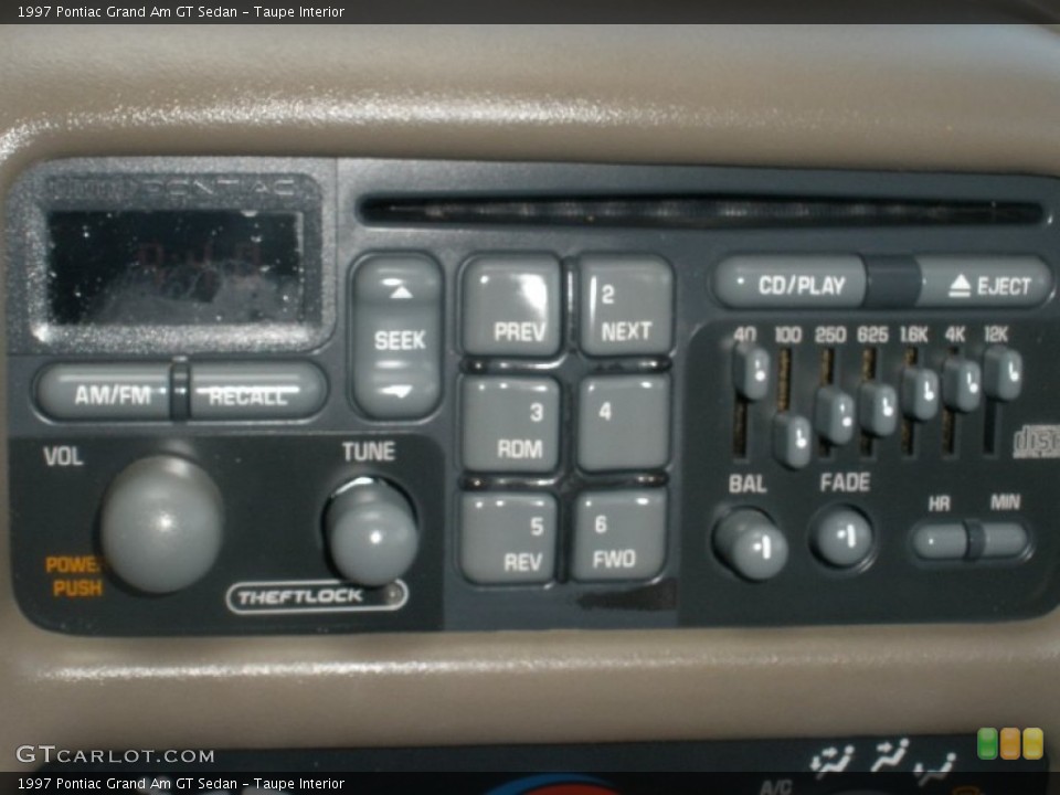 Taupe Interior Controls for the 1997 Pontiac Grand Am GT Sedan #82113895