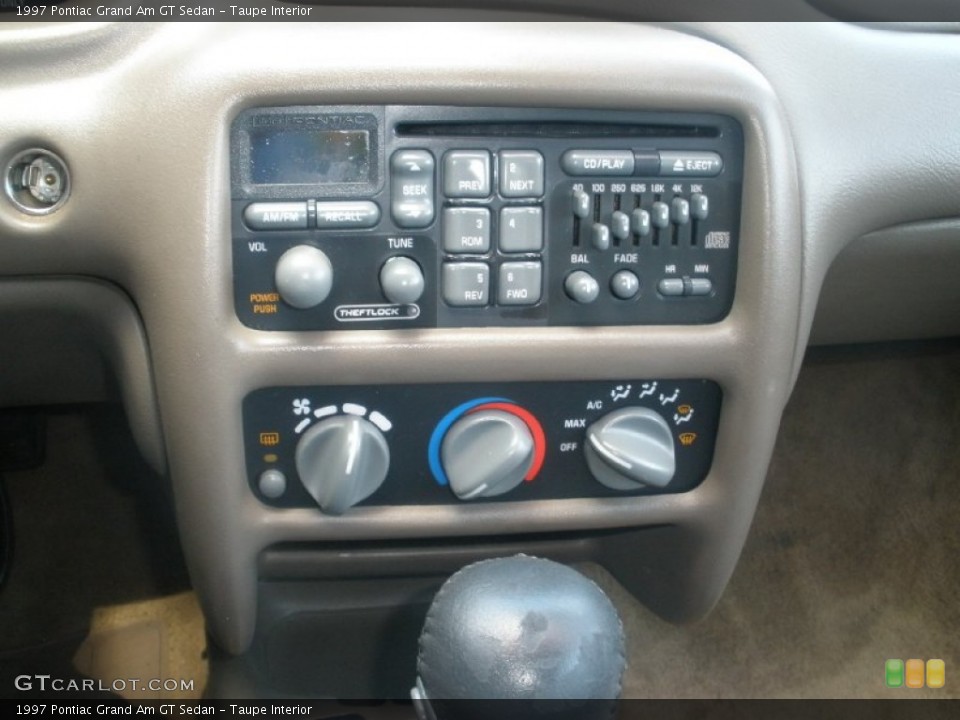 Taupe Interior Controls for the 1997 Pontiac Grand Am GT Sedan #82113928