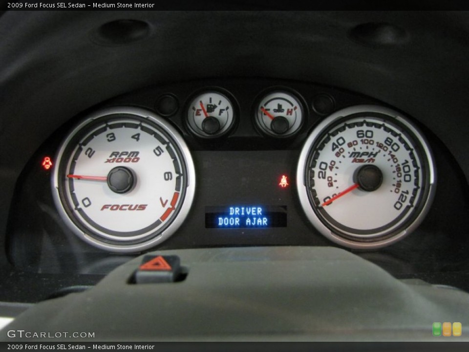 Medium Stone Interior Gauges for the 2009 Ford Focus SEL Sedan #82126708