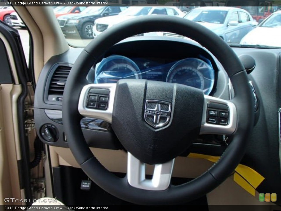 Black/Sandstorm Interior Steering Wheel for the 2013 Dodge Grand Caravan Crew #82135054
