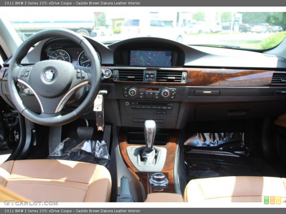 Saddle Brown Dakota Leather Interior Dashboard for the 2011 BMW 3 Series 335i xDrive Coupe #82137757