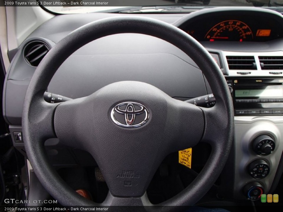 Dark Charcoal Interior Steering Wheel for the 2009 Toyota Yaris S 3 Door Liftback #82139755