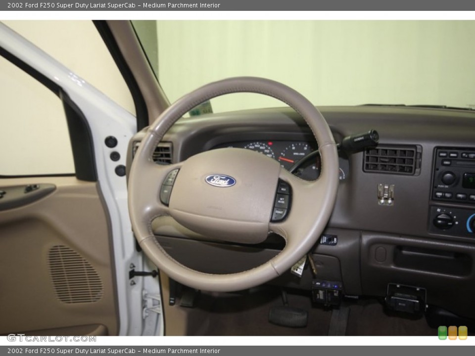 Medium Parchment Interior Steering Wheel for the 2002 Ford F250 Super Duty Lariat SuperCab #82145478