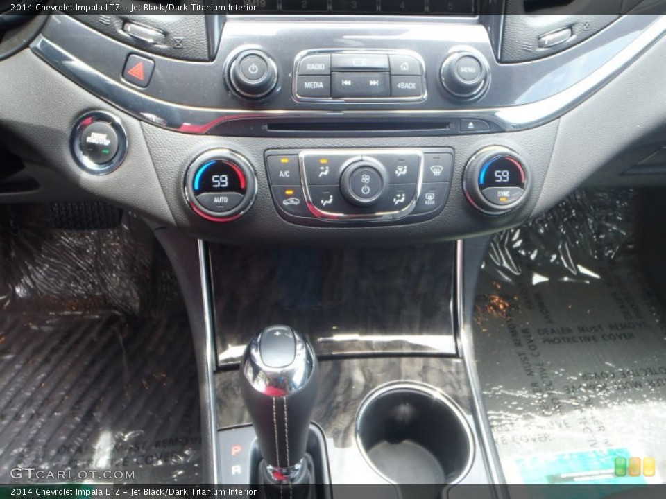 Jet Black/Dark Titanium Interior Controls for the 2014 Chevrolet Impala LTZ #82166483