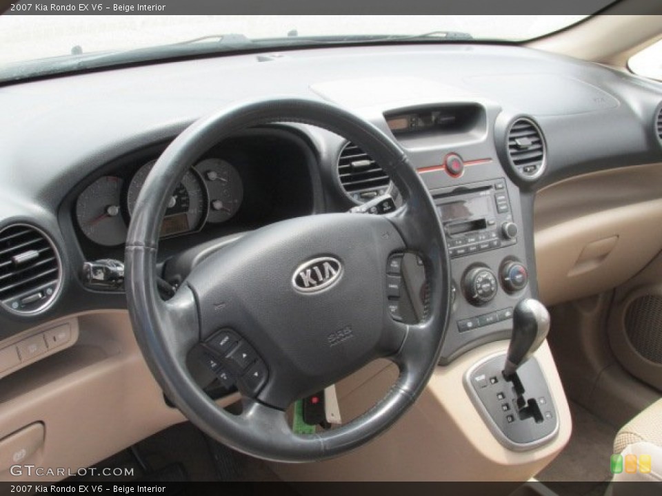 Beige Interior Dashboard for the 2007 Kia Rondo EX V6 #82233513