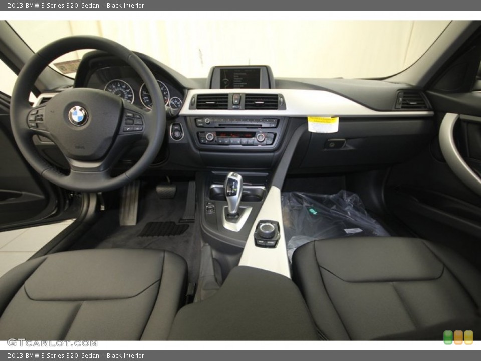 Black Interior Dashboard for the 2013 BMW 3 Series 320i Sedan #82259604