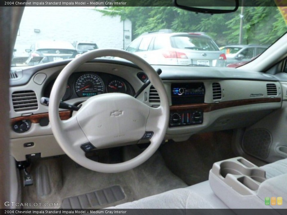 Medium Gray Interior Dashboard for the 2004 Chevrolet Impala  #82310741