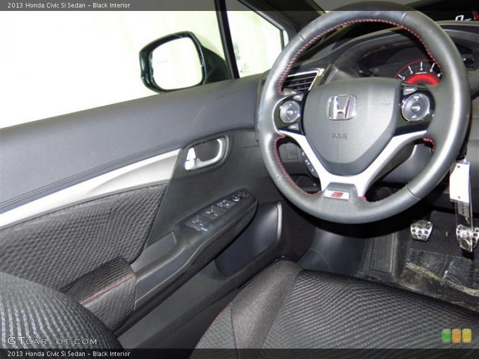 Black Interior Steering Wheel for the 2013 Honda Civic Si Sedan #82358591