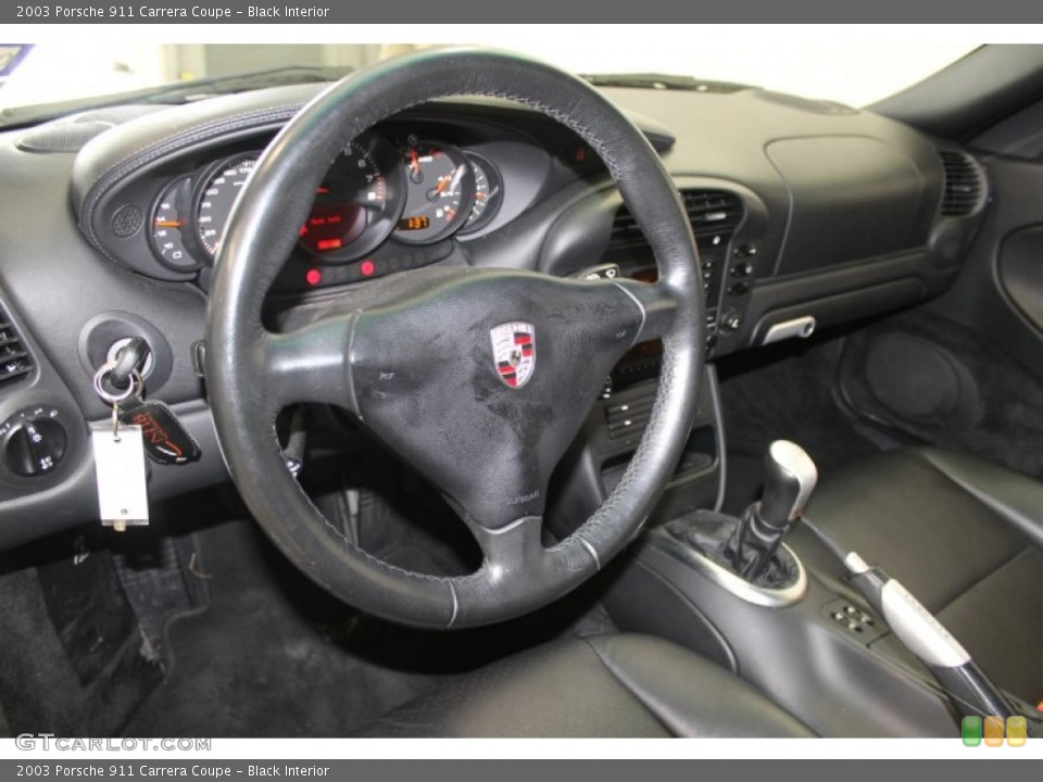 Black Interior Steering Wheel for the 2003 Porsche 911 Carrera Coupe #82374920