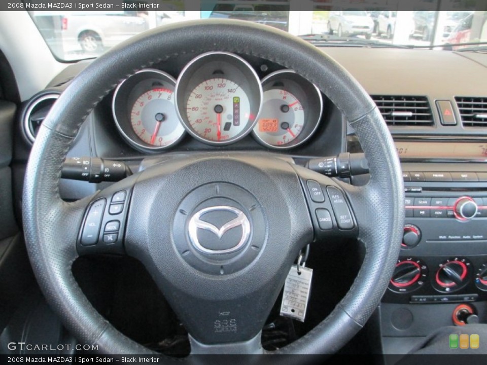 Black Interior Steering Wheel for the 2008 Mazda MAZDA3 i Sport Sedan #82375480