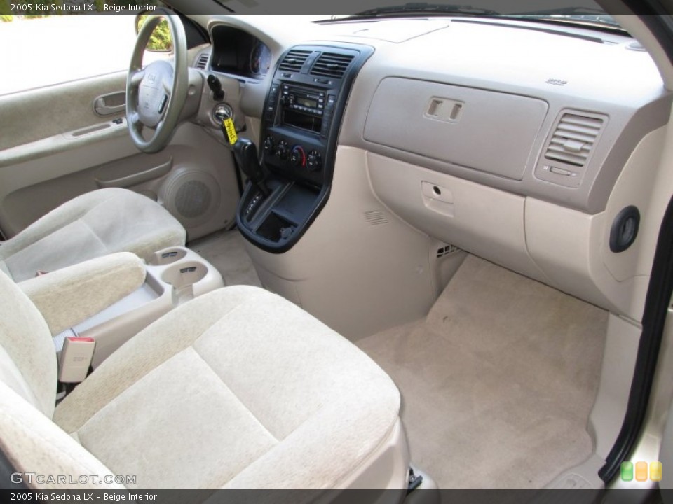Beige Interior Dashboard for the 2005 Kia Sedona LX #82376941