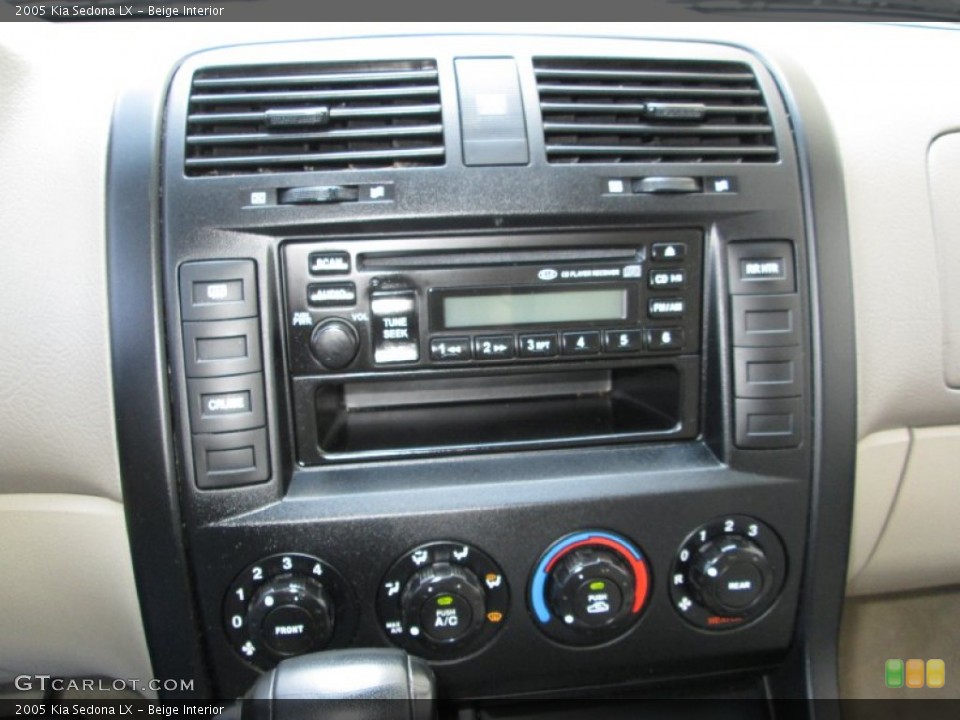 Beige Interior Controls for the 2005 Kia Sedona LX #82377049