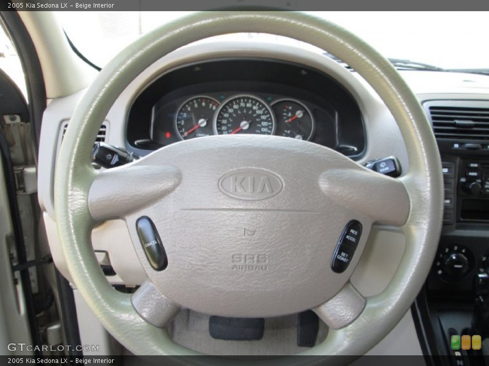 Beige Interior Steering Wheel for the 2005 Kia Sedona LX #82377104