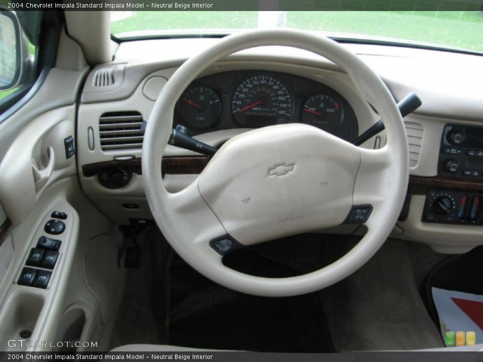 Neutral Beige Interior Steering Wheel for the 2004 Chevrolet Impala  #82393251