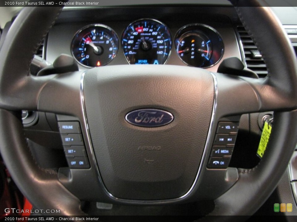 Charcoal Black Interior Steering Wheel for the 2010 Ford Taurus SEL AWD #82402419