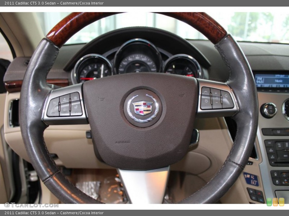Cashmere/Cocoa Interior Steering Wheel for the 2011 Cadillac CTS 3.0 Sedan #82442492