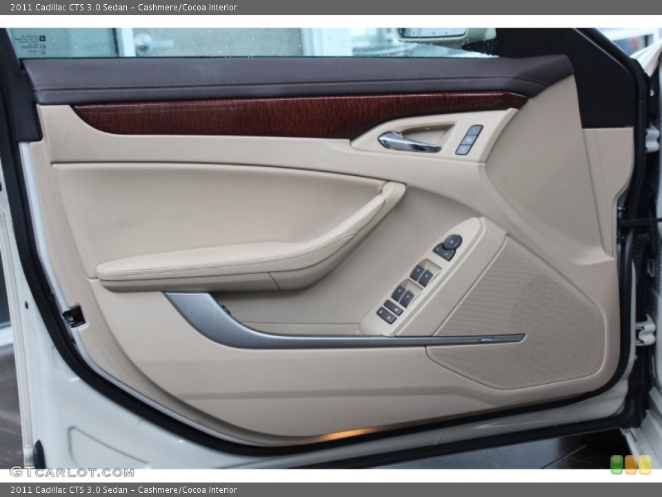 Cashmere/Cocoa Interior Door Panel for the 2011 Cadillac CTS 3.0 Sedan #82442511