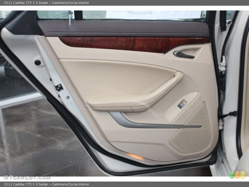 Cashmere/Cocoa Interior Door Panel for the 2011 Cadillac CTS 3.0 Sedan #82442547
