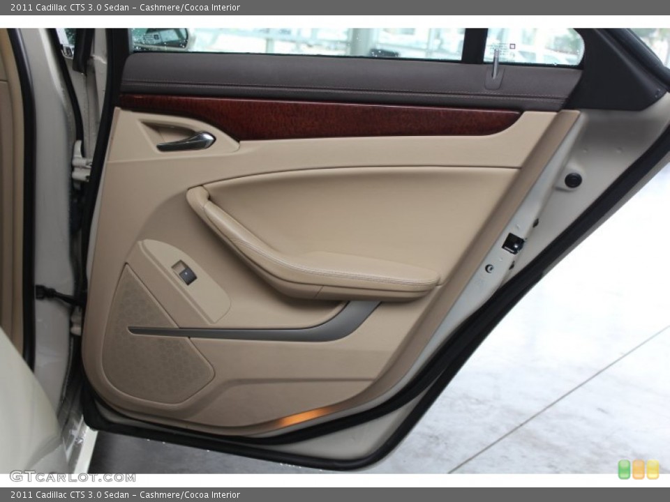Cashmere/Cocoa Interior Door Panel for the 2011 Cadillac CTS 3.0 Sedan #82442565
