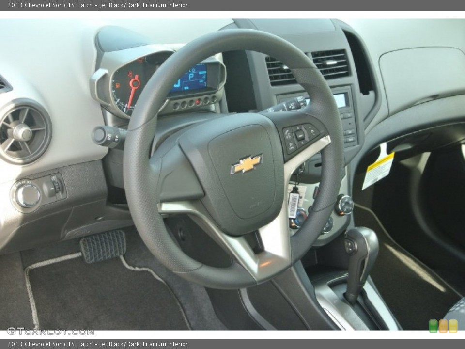 Jet Black/Dark Titanium Interior Steering Wheel for the 2013 Chevrolet Sonic LS Hatch #82450729