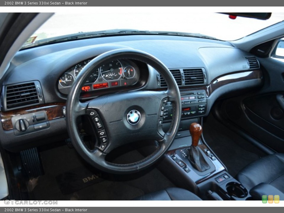 Black Interior Dashboard for the 2002 BMW 3 Series 330xi Sedan #82469939