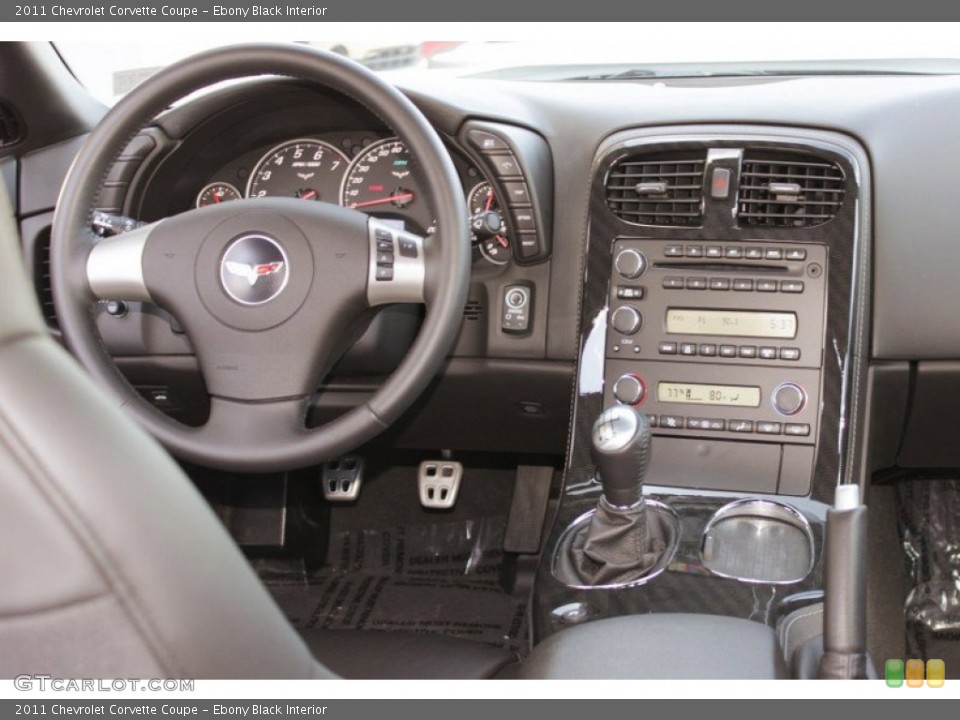 Ebony Black Interior Dashboard for the 2011 Chevrolet Corvette Coupe #82486904