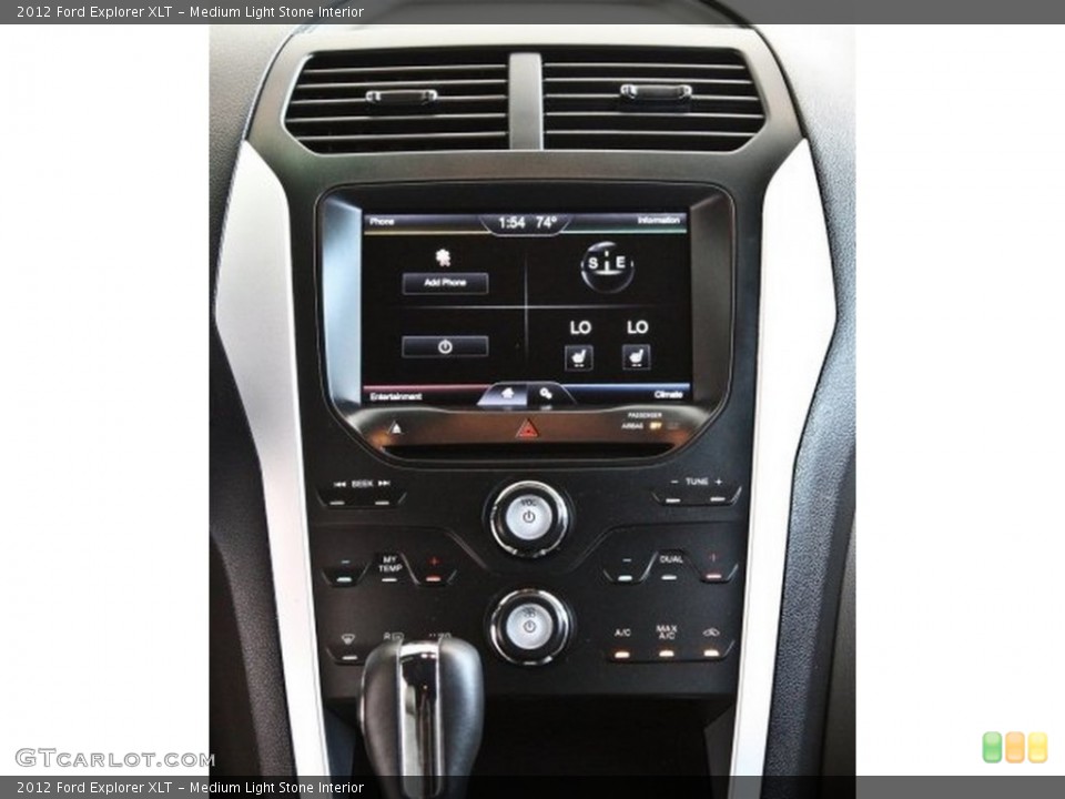Medium Light Stone Interior Controls for the 2012 Ford Explorer XLT #82515208