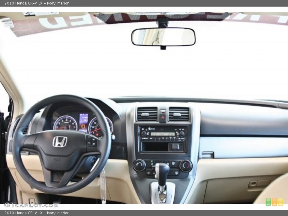 Ivory Interior Dashboard for the 2010 Honda CR-V LX #82521542