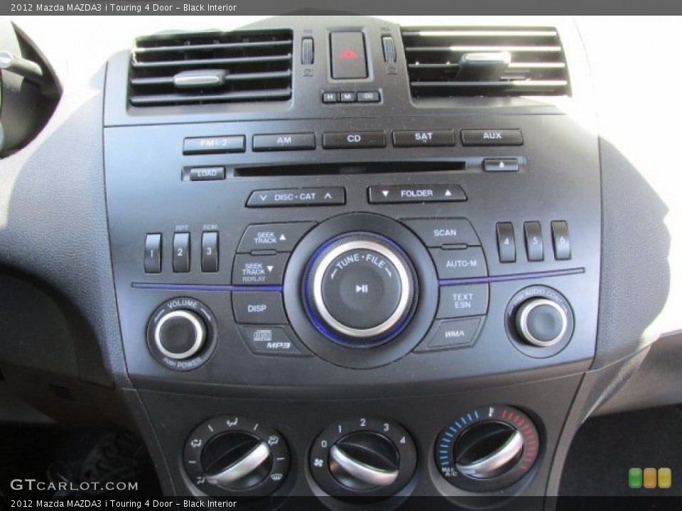 Black Interior Controls for the 2012 Mazda MAZDA3 i Touring 4 Door #82537925