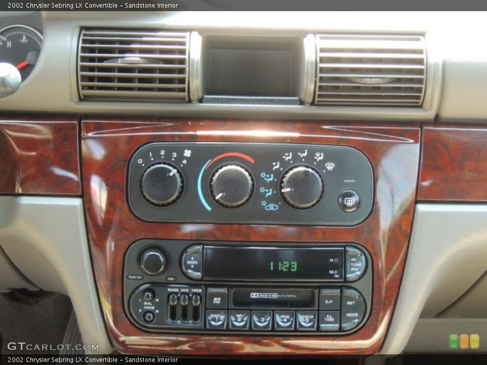 Sandstone Interior Controls for the 2002 Chrysler Sebring LX Convertible #82558486