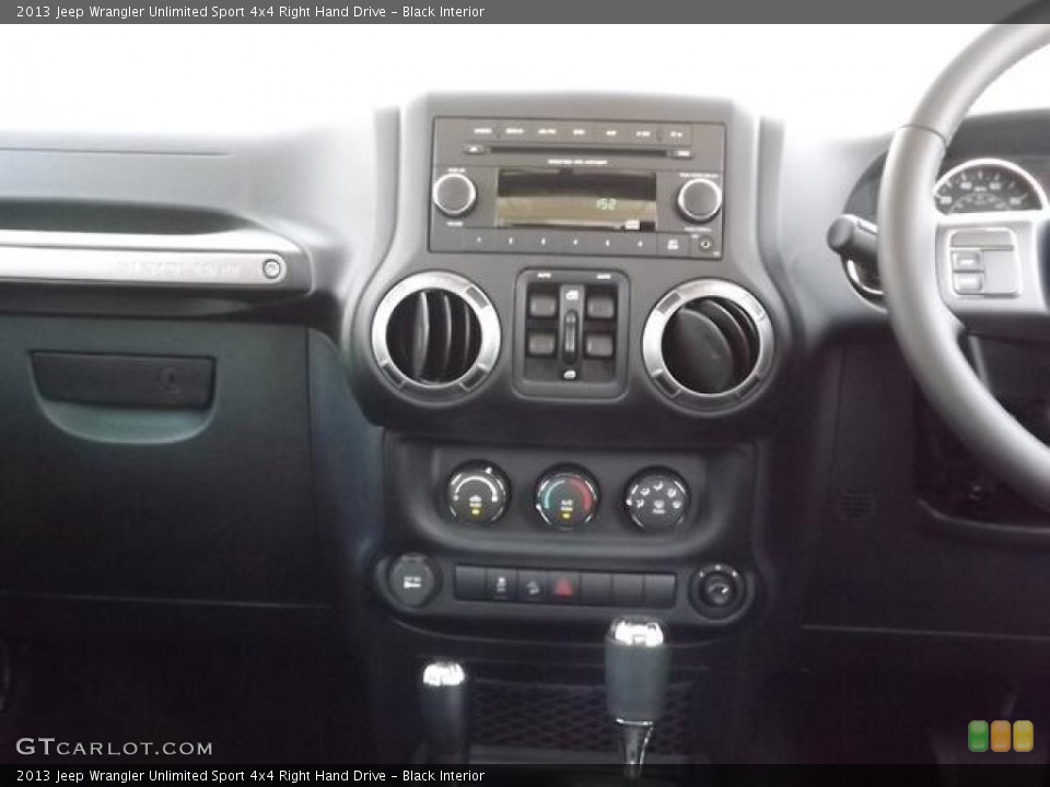 Black Interior Controls for the 2013 Jeep Wrangler Unlimited Sport 4x4 Right Hand Drive #82586585